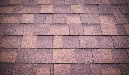 roof of new brown shingles background and texture. vignette