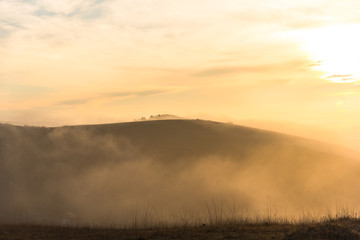 Fototapeta na wymiar Morning fog on the hill