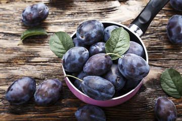  plum on a wooden background