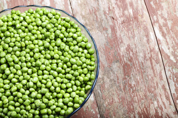   young peas peeled in a plate