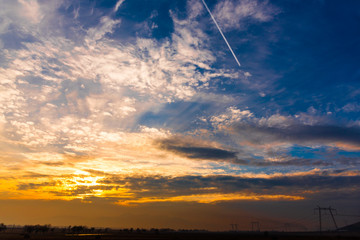 Obraz premium Clouds at the sunset