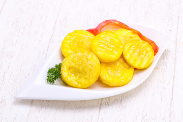 Pickled zucchini in the bowl