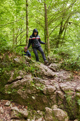 Obraz premium Group of people hiking on a trail