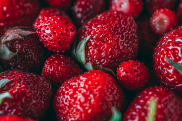 Strawberry and wild strawberry macro closeup texture