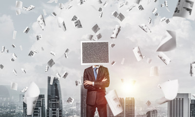 Businessman with monitor instead of head.