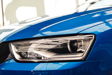 Headlight of a modern car close up