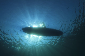 Fototapeta na wymiar Standup Paddle Board from underwater 