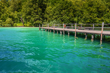 Pier on the lake. Plitvice Lakes in the evening.