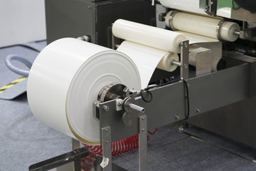 Automatic packing machine with plastic bag and paper box