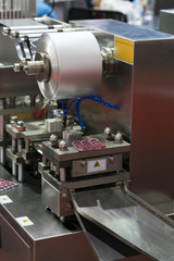 Automatic packing machine with plastic bag and paper box