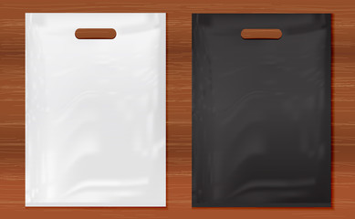 Quality Plastic Bags on wooden background,white and black plastic bag.Mockup set of Realistic Shopping Bag for branding and corporate identity design.Vector set mock up.