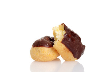 chocolate eclairs with a bite taken out