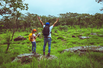 Lover woman and men Asian travel nature. Travel relax. Photography Cucumber sessilis flower field.