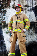Fototapeta premium portrait of handsome fireman in uniform