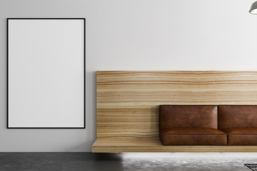 big blank poster on light wall