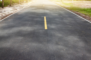 Yellow line on the road.