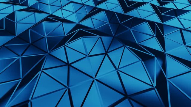 Blue triangulated surface in dynamic light. Abstract 3D rendering of modern low poly shape. Seamless loop animation 4k UHD 3840x2160
