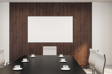 blank white poster in meeting room
