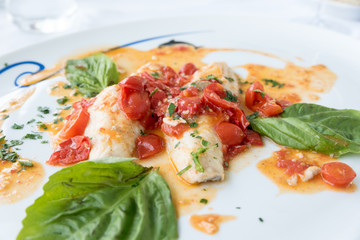 Cod with tomato and basil