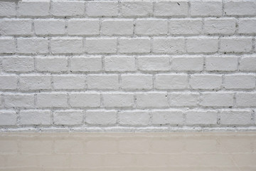 background of white brick wall with ceramic floor.