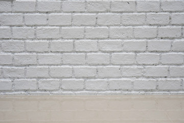 background of white brick wall with ceramic floor.