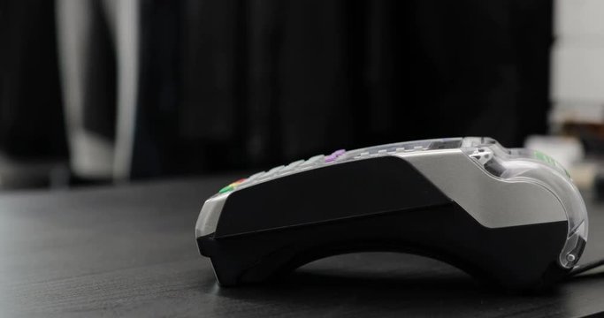 Close-up shot of person using mobile payment PayPass.