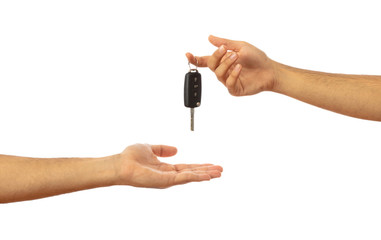 Handing over the car key. Hands isolated on white background, clipping path