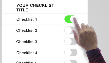 Hand toggles a checklist to On state on a blank virtual on-screen checklist mock up for text or labels input.