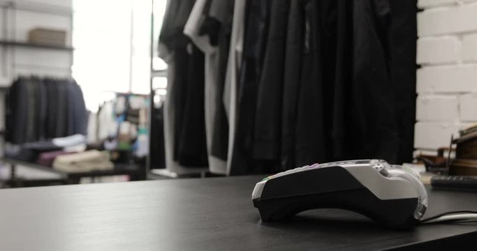 Close-up shot of person using mobile payment PayPass.