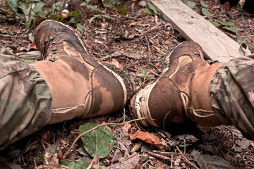 Muddy boots after a long day in the mountains