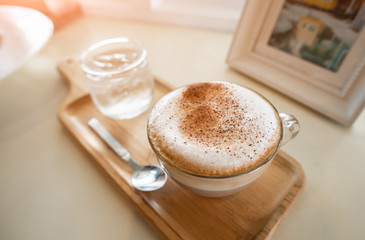 Morning coffee in warm color  lighting.