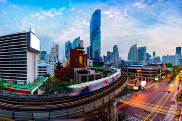 Aerial view of Bangkok modern office buildings and condominium in Bangkok city downtown with blue sky and clouds at Bangkok, Thailand. BTS skytrain - obrazy, fototapety, plakaty