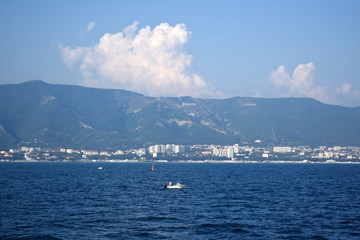 Gelendzhik, Russia - June 27, 2018: The view of the town and Markotkh ridge from the sea