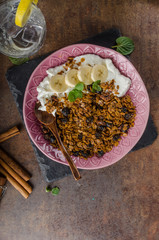 Granola baked in oven with nuts