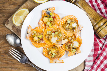 Scallops baked with garlic butter.