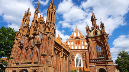 Beautiful sky with white clouds on St. Anne's church in Vilnius old town, Lithuania 