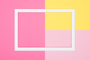 Abstract geometrical pastel pink and yellow paper flat lay background. Minimalism, geometry and...