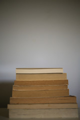 Stack of Vintage Paperback Pile of Antique Books - Education Wisdom Back to School Concept with Copy Space