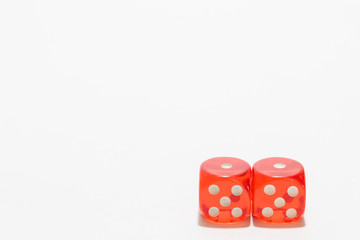 Red dice, typical gambling. With white background and copy space.