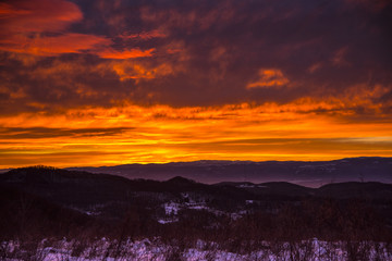 Fantastic colors of clouds at winter sunrise