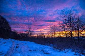 Fantastic colors of clouds at winter sunrise