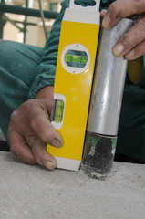 welds of a railing during the renovation of a roof in the evening in Italy