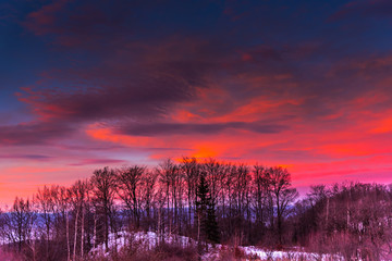 Winter red sunrise in the mountains