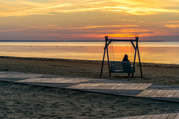 Sunset at sandy beach of the Baltic sea