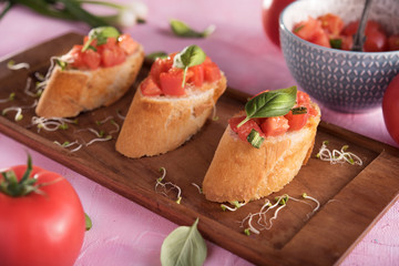 Traditional italian bruschetta on bright background