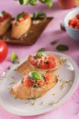 Traditional italian bruschetta on bright background