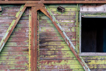 Wooden wall of the old building car