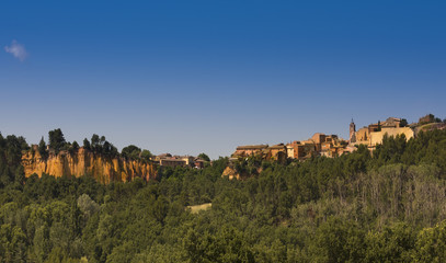 View of Roussillon with ocher cliffs. Vaucluse, Provence, France