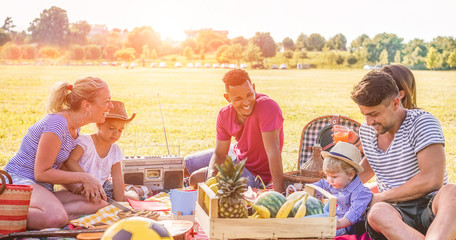 Happy families doing picnic in nature park outdoor