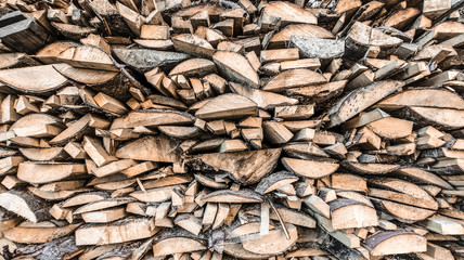 Wooden natural sawn a logs close up, texture for background, front view